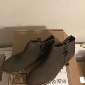 Brown bootie. Never been worn. Received as a gift. Smoke free environment.